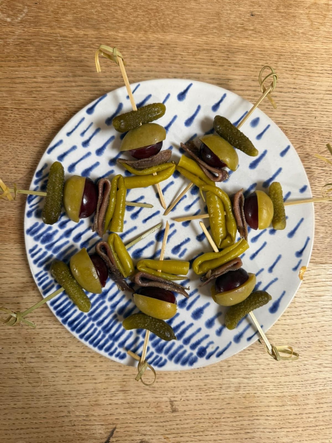 Gildas with anchovies, olives, pickled chillies and cornichons, ready for the table